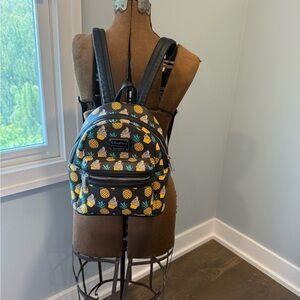 Disney Parks Loungefly Dole Whip pineapple print Backpack